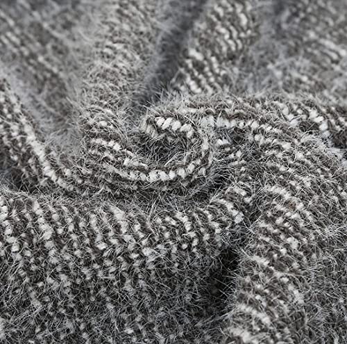 Knitted poncho fabric swatch in dark gray with woven stripe pattern and fuzzy texture