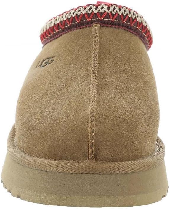 Back view of chestnut Kids' Tazz slipper with red knit collar and split seam