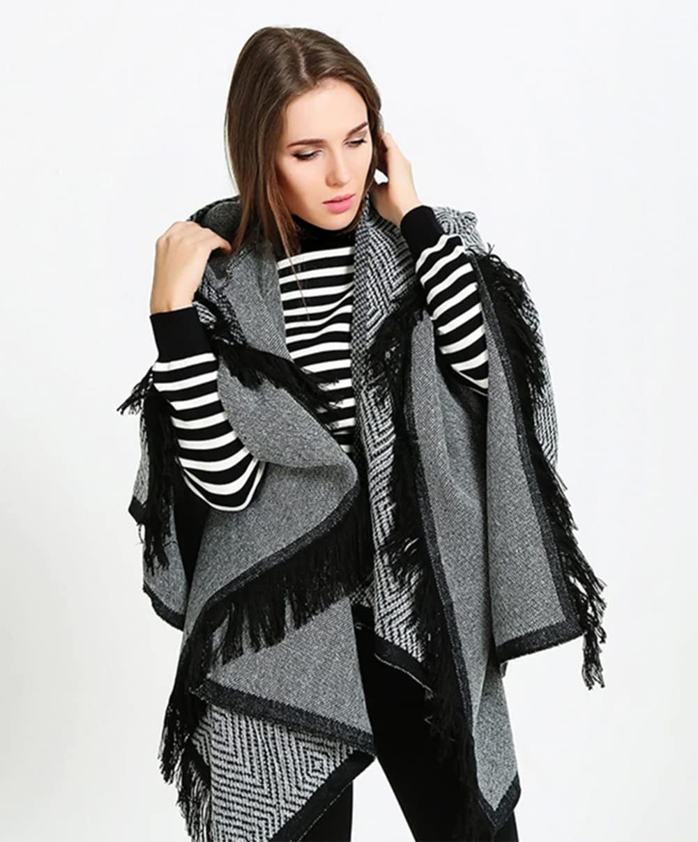 Women’s open-front hooded poncho cape with black-and-gray geometric knit panels and fringe
