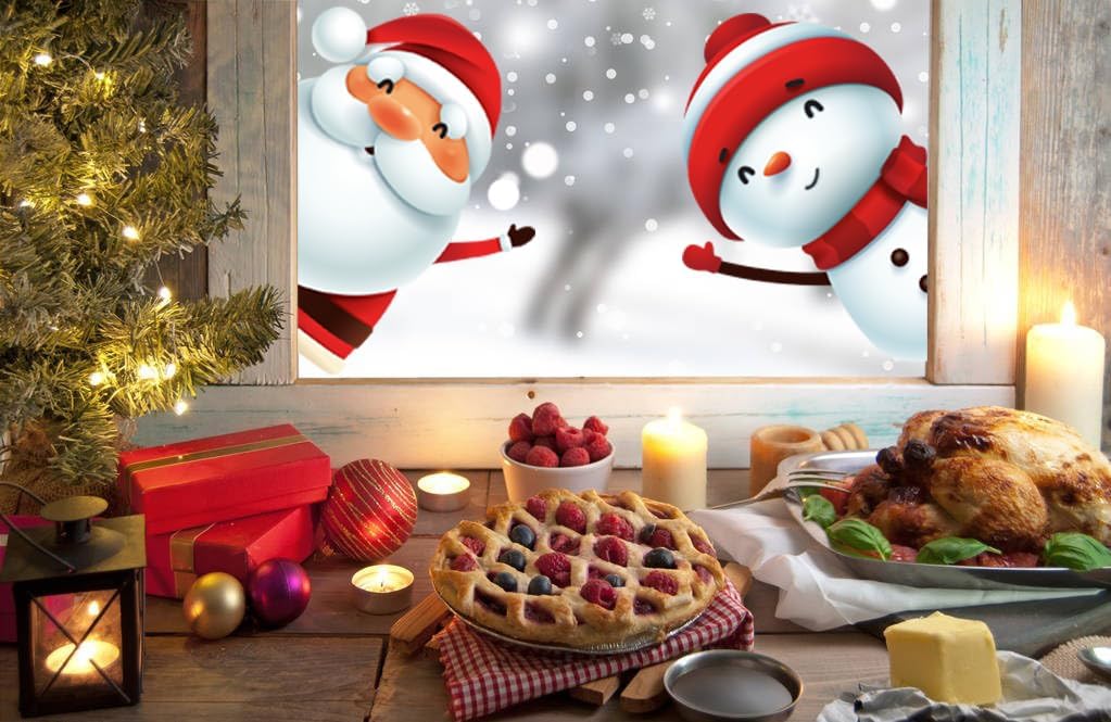 Christmas window stickers featuring Santa and snowflakes on a frosted window look