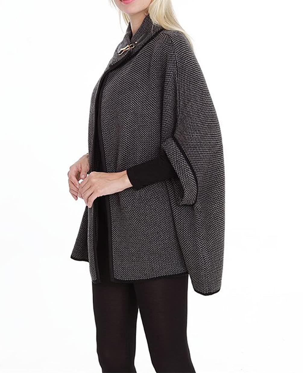 Dark grey knit poncho cardigan with black trim, neck buckle, side drape