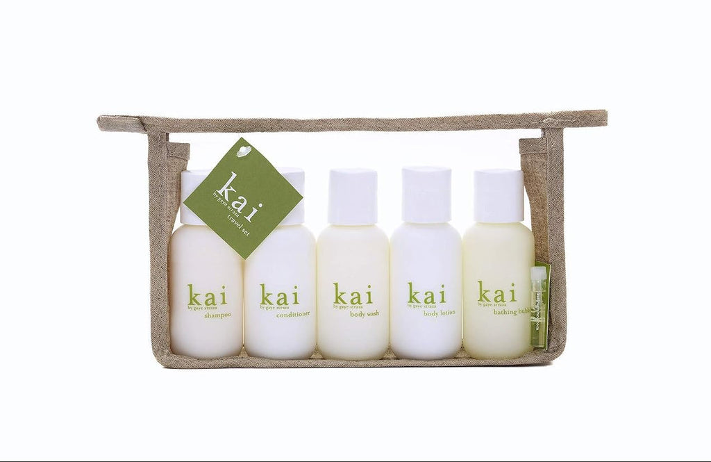 Bath travel toiletry set with five small bottles and fabric zip pouch, white caps