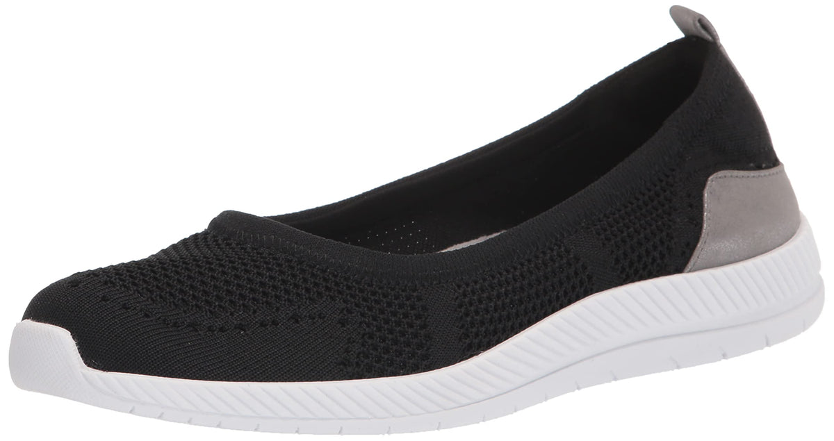 Women's slip-on sneaker with black mesh upper, gray heel patch, and white cushioned sole