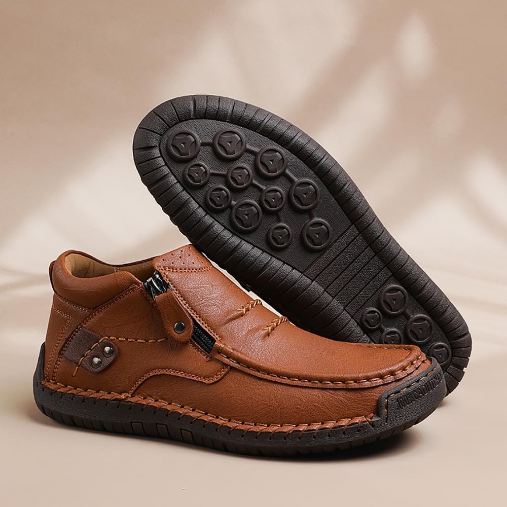 Brown leather driving boot with stitched apron seam and rugged rubber sole