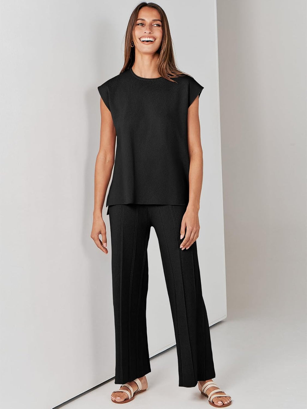 Black sleeveless top and wide-leg pants lounge set, model standing front view