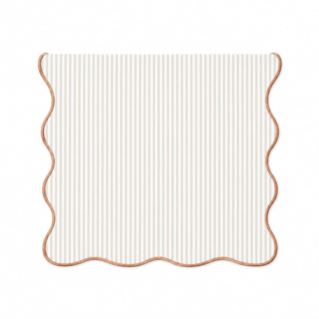 Natural and white striped table runner with scalloped edges, lined