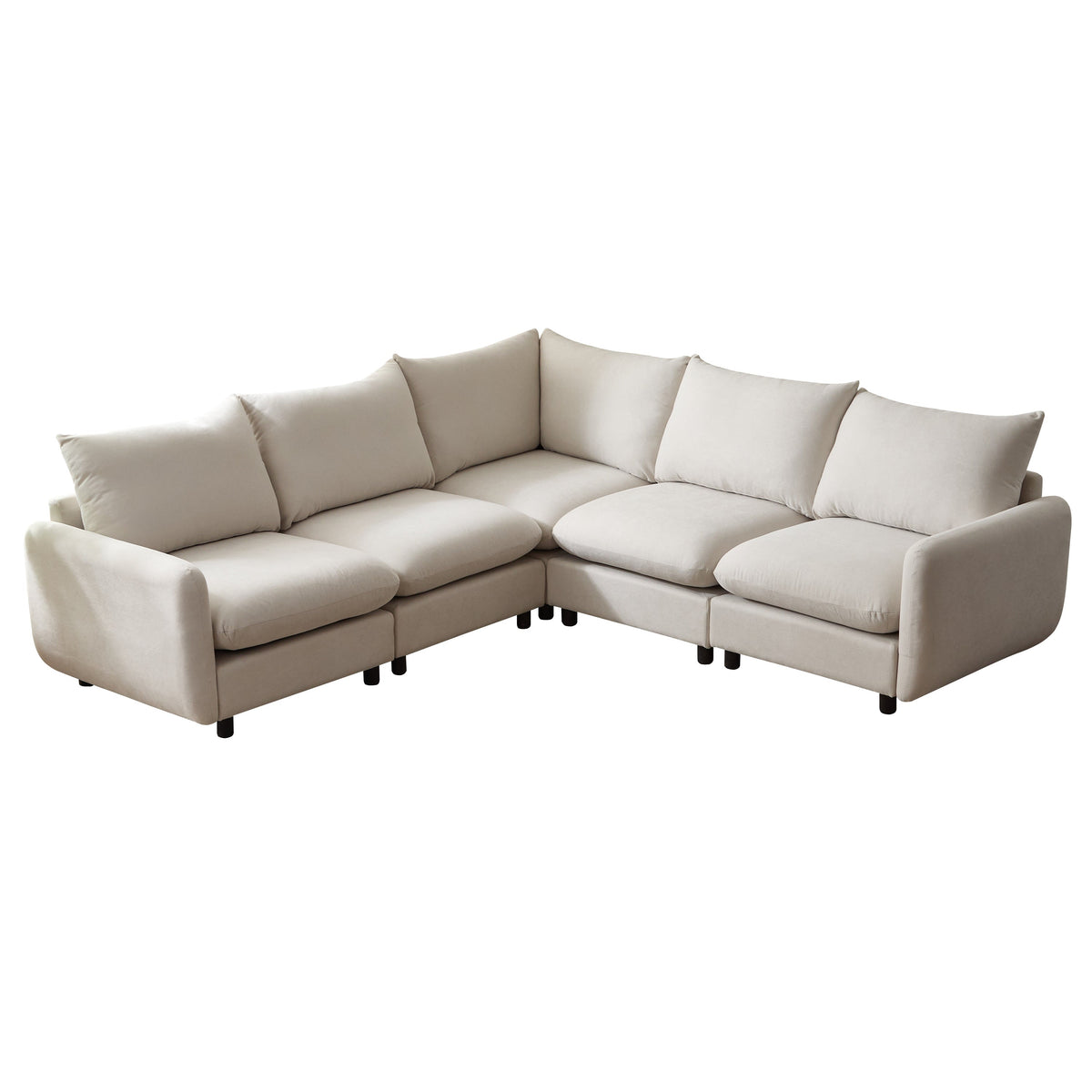 White modular L-shaped sectional sofa with tufted back cushions and angled chaise