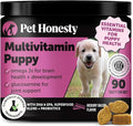 Multivitamin puppy treat container with dog photo and 90 tasty chews graphic