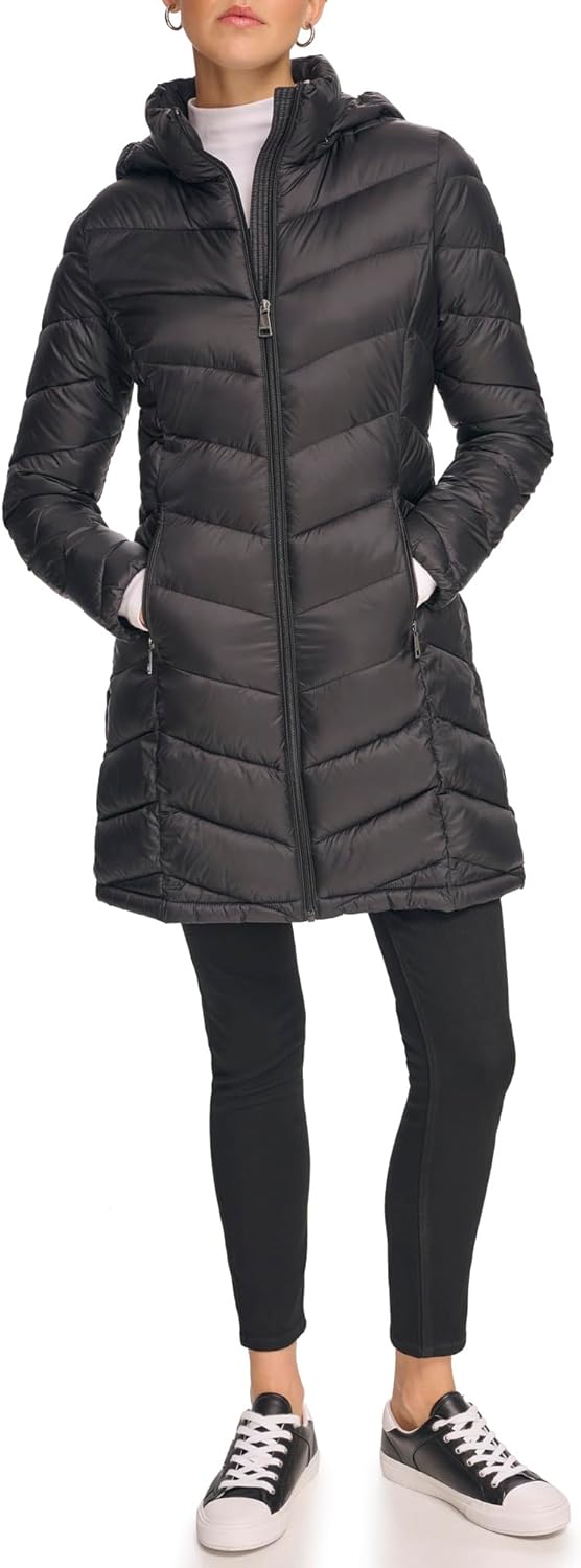 Women's long chevron puffer jacket, black with front zipper and side pockets