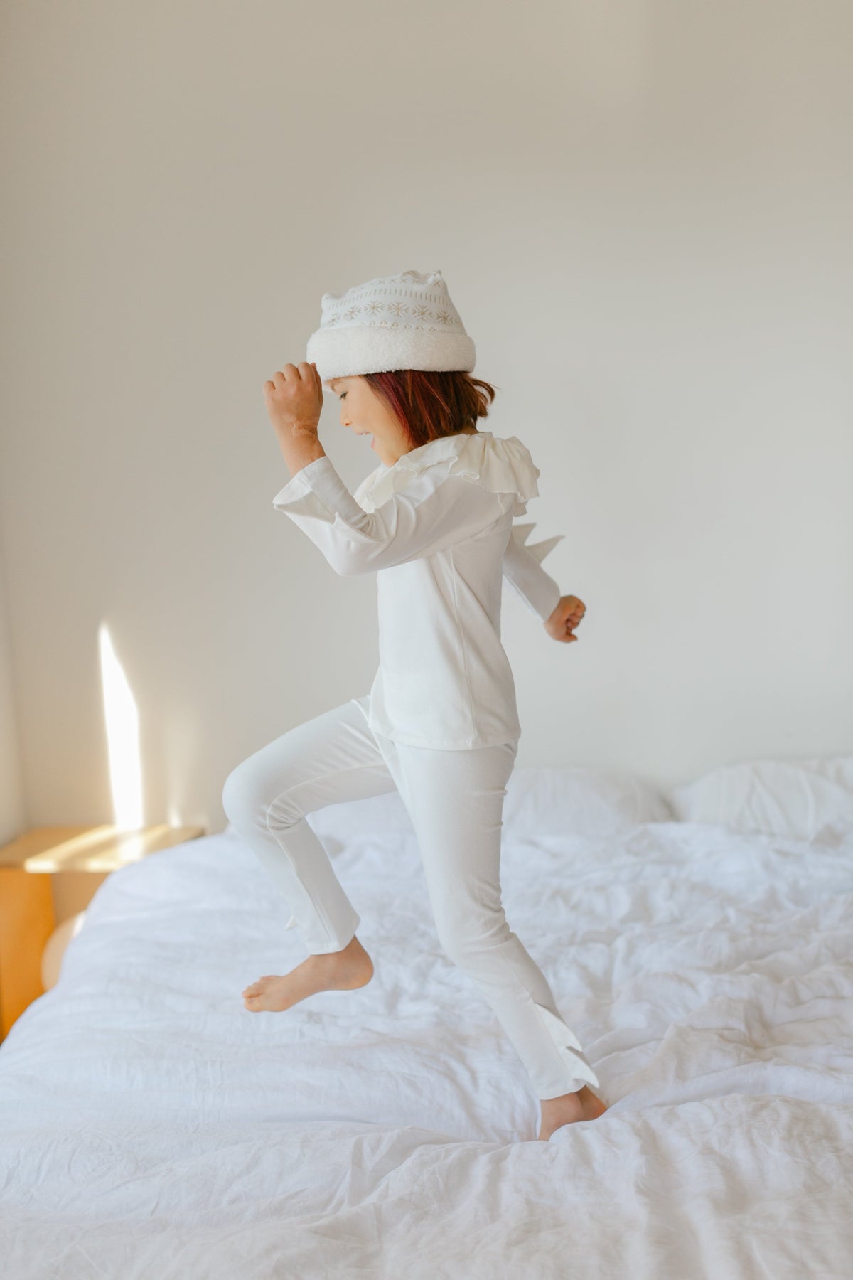 White elf costume set for kids with hooded hat and long-sleeve ruffled tunic