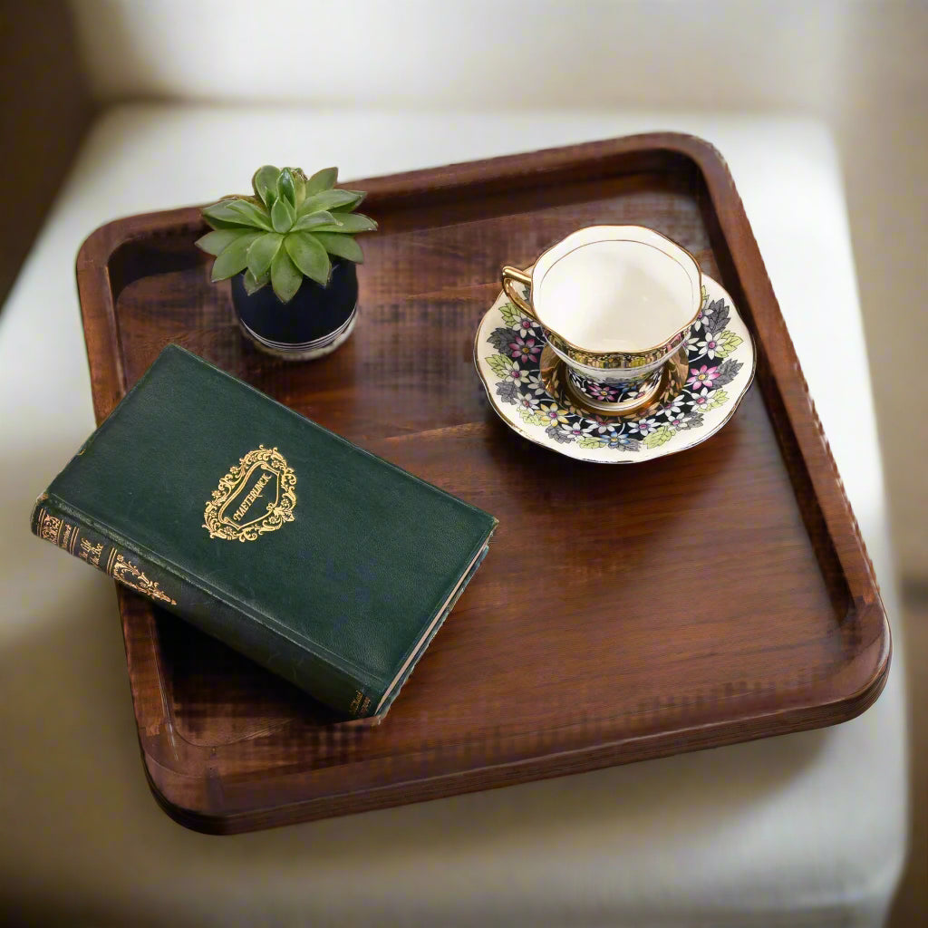 Square wooden serving tray, dark brown with solid bottom and raised rim