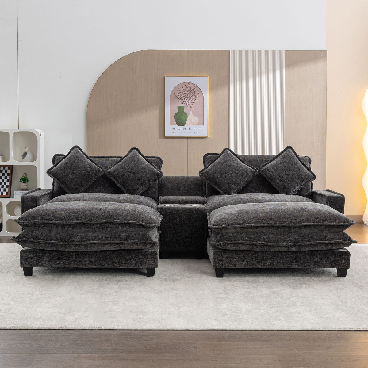 Dark gray sectional sofa with two removable ottomans and decorative square throw pillows