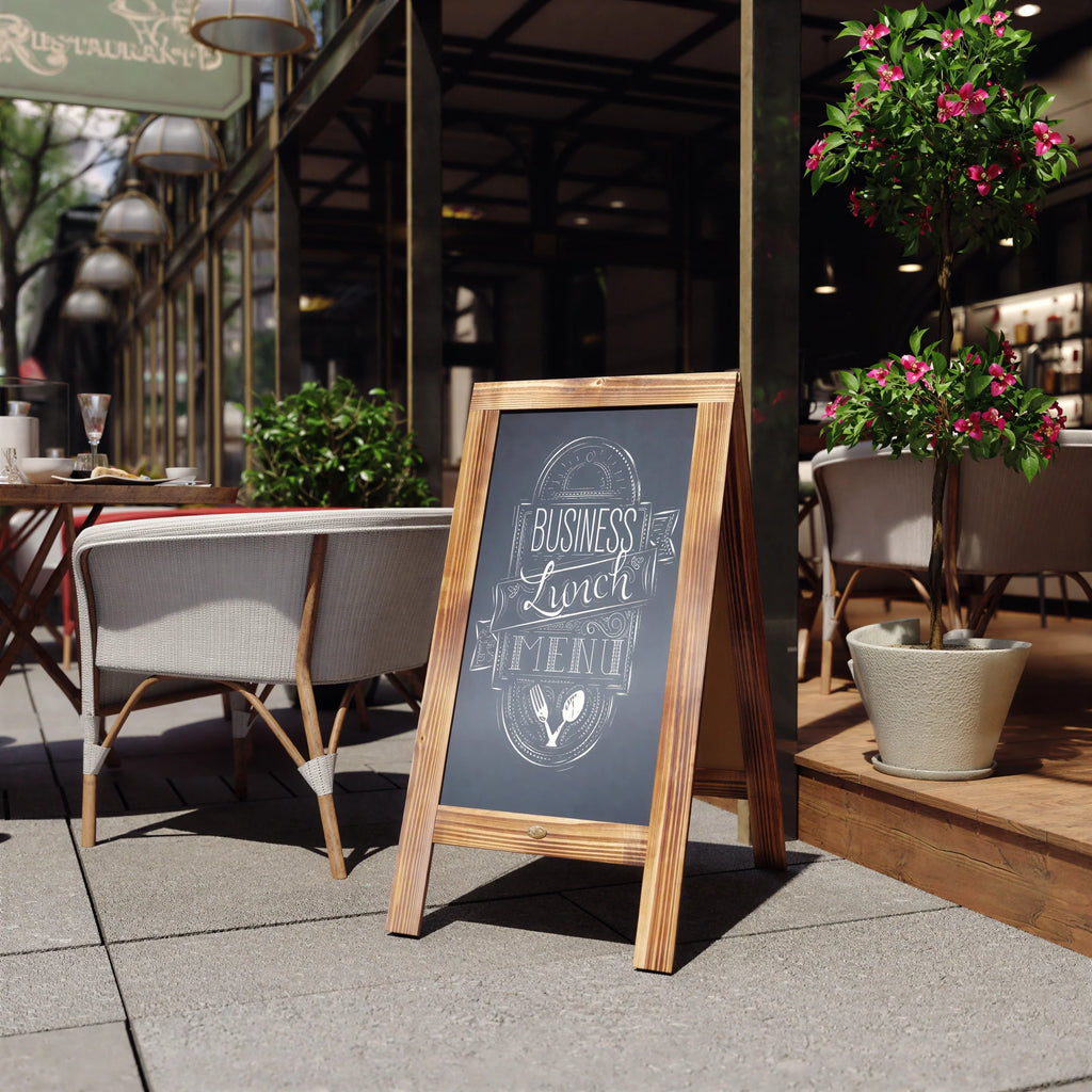 A-frame chalkboard sign in wood frame with 'Business Lunch MENU' chalk text