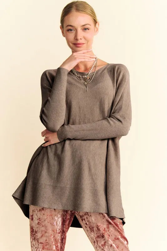 Coffee brown knit top with round neck, dropped shoulders, and long sleeves