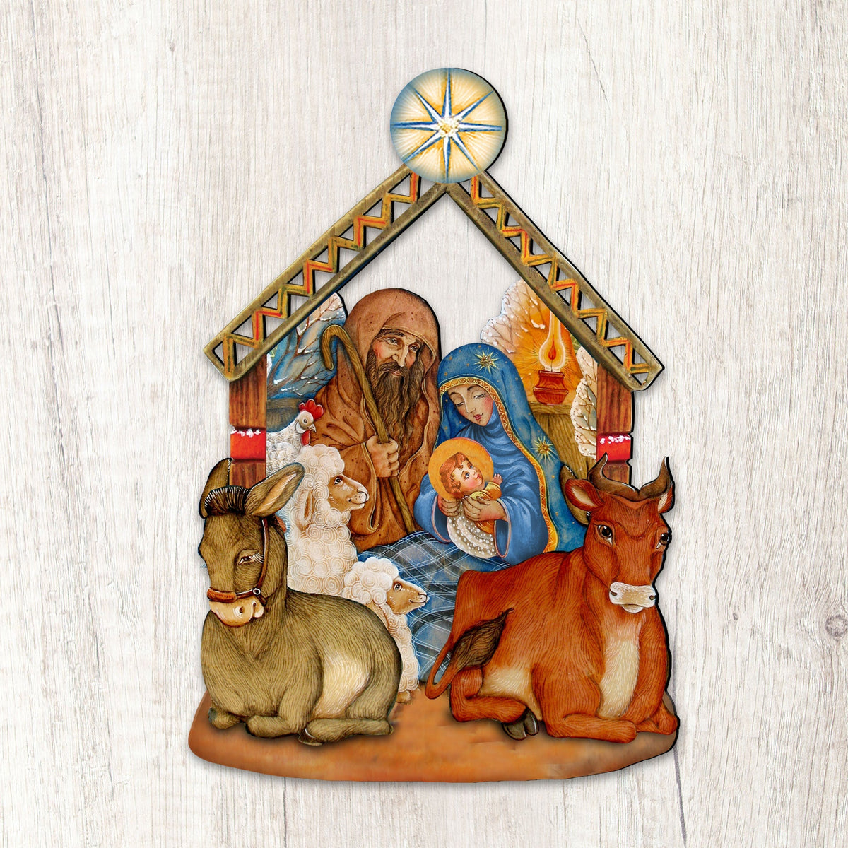 Nativity wooden door decor with manger scene, Mary, Joseph, baby, donkey, cow, and star