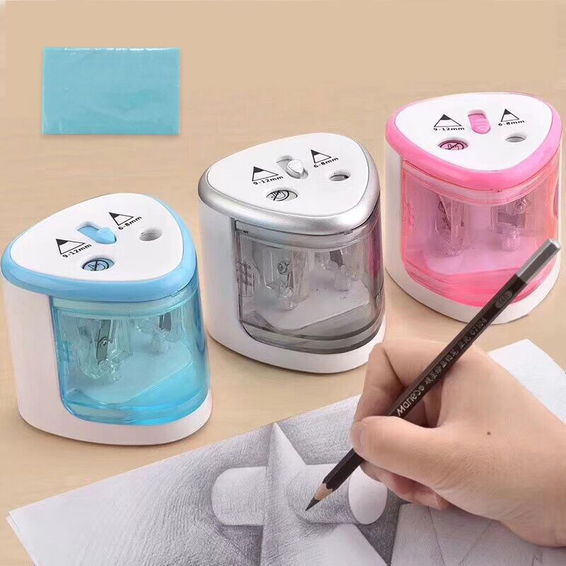 Blue and pink two-hole electric pencil sharpener with clear shavings chamber