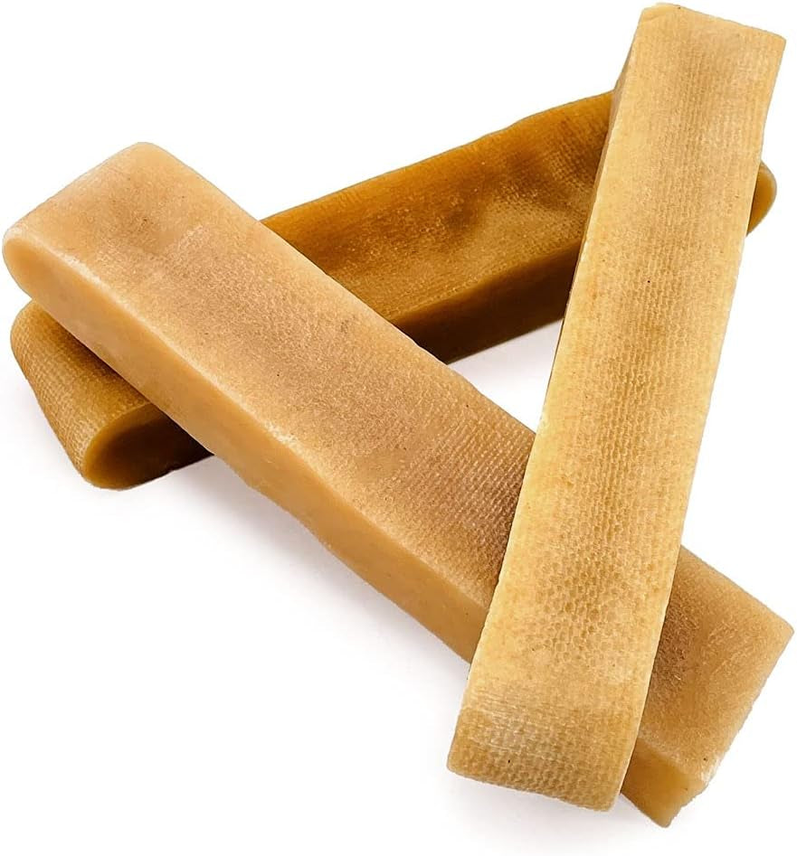 Yak cheese dog chews, tan stick chews with curved ends