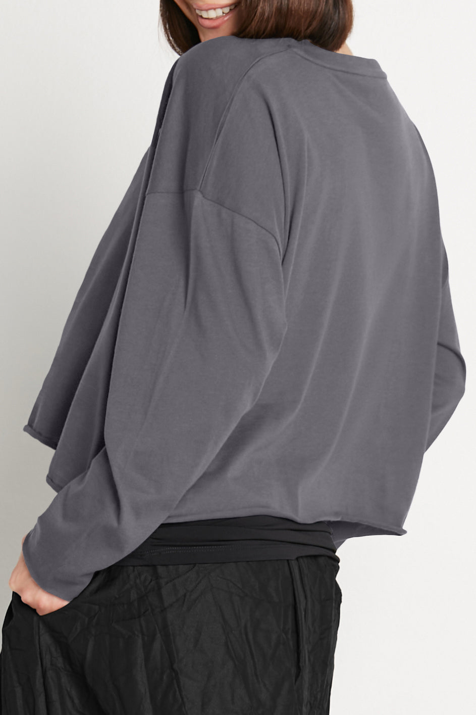 Dark gray boxy long-sleeve Pima cotton mini t-shirt, dropped shoulder, relaxed drape