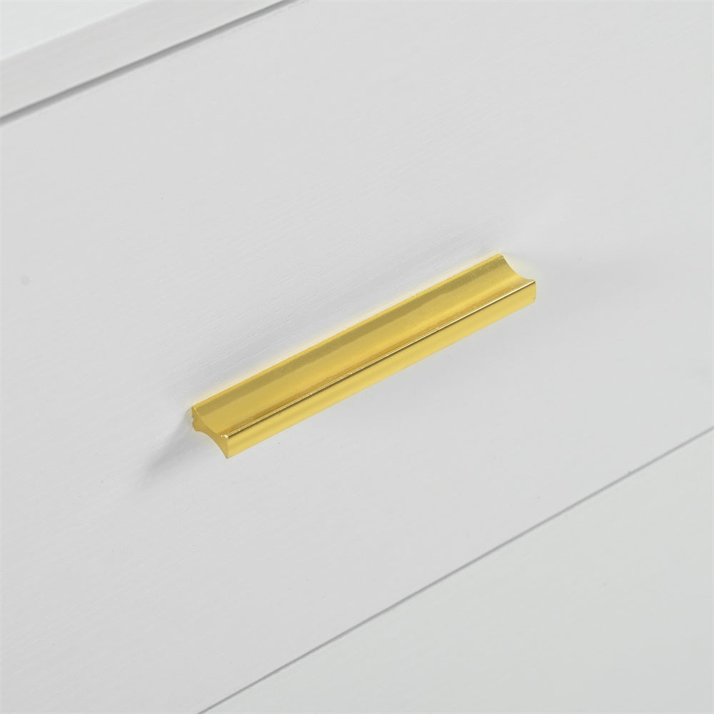 Gold bar drawer pull on white dresser drawer front