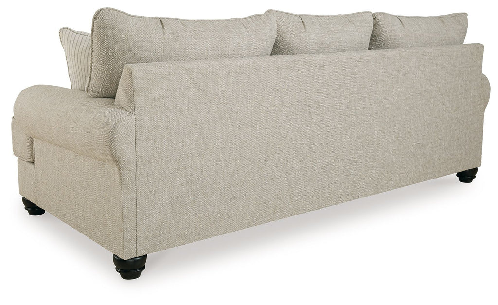 Fog sofa with light beige fabric upholstery and dark legs