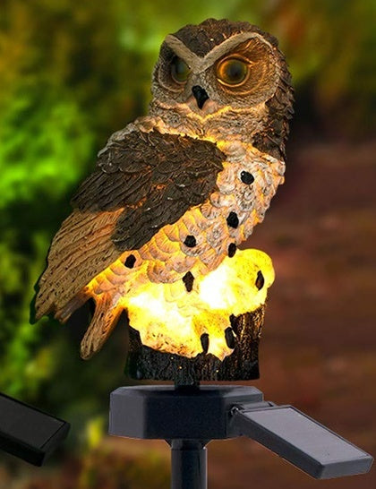 Outdoor solar owl garden light with brown owl, warm LED glow and black stake
