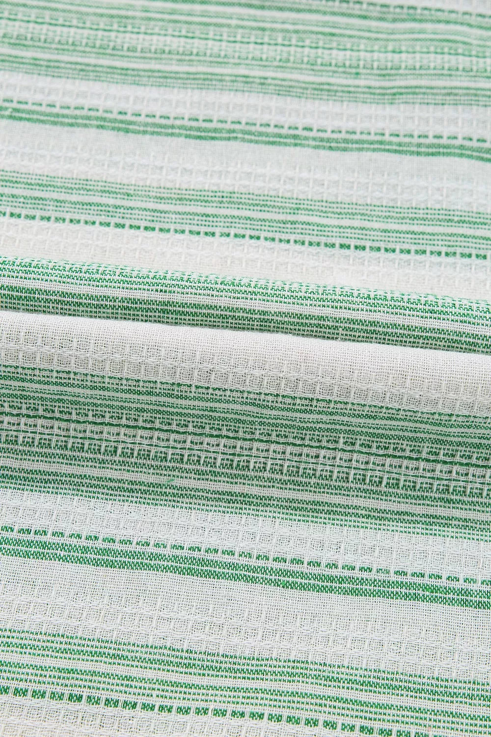 Light green and white striped gauze blouse fabric texture