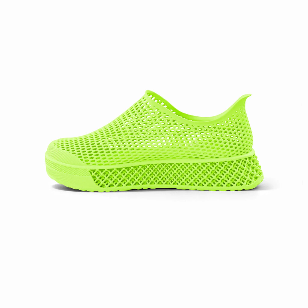 Neon green 3D-printed casual sneakers side view with perforated mesh upper