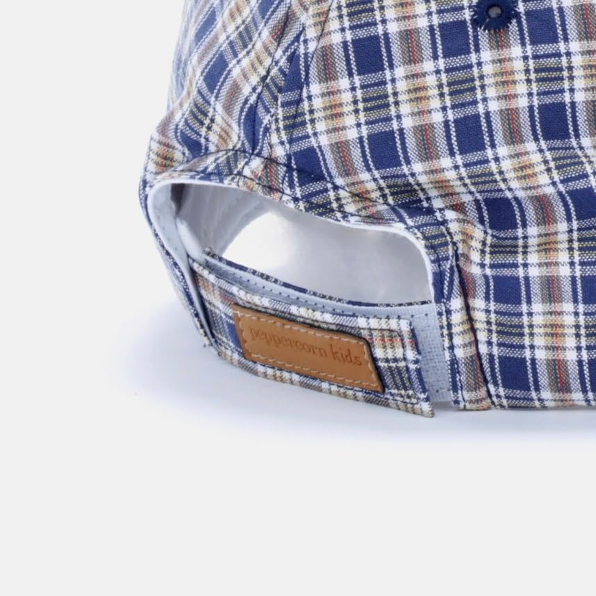 Kids blue plaid baseball cap interior with stitched seams and tan brand patch
