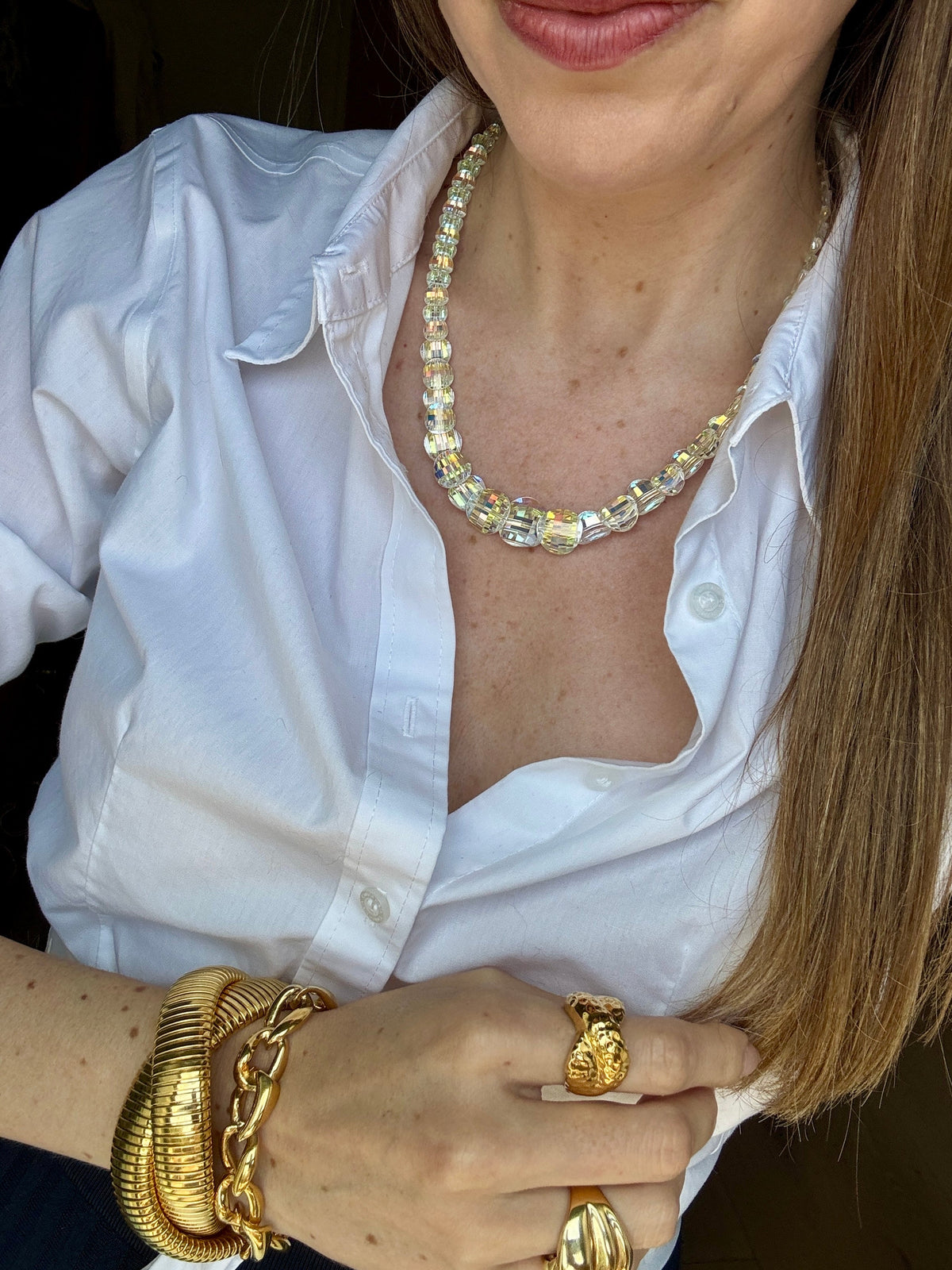 Iridescent faceted crystal bead necklace with smooth center link