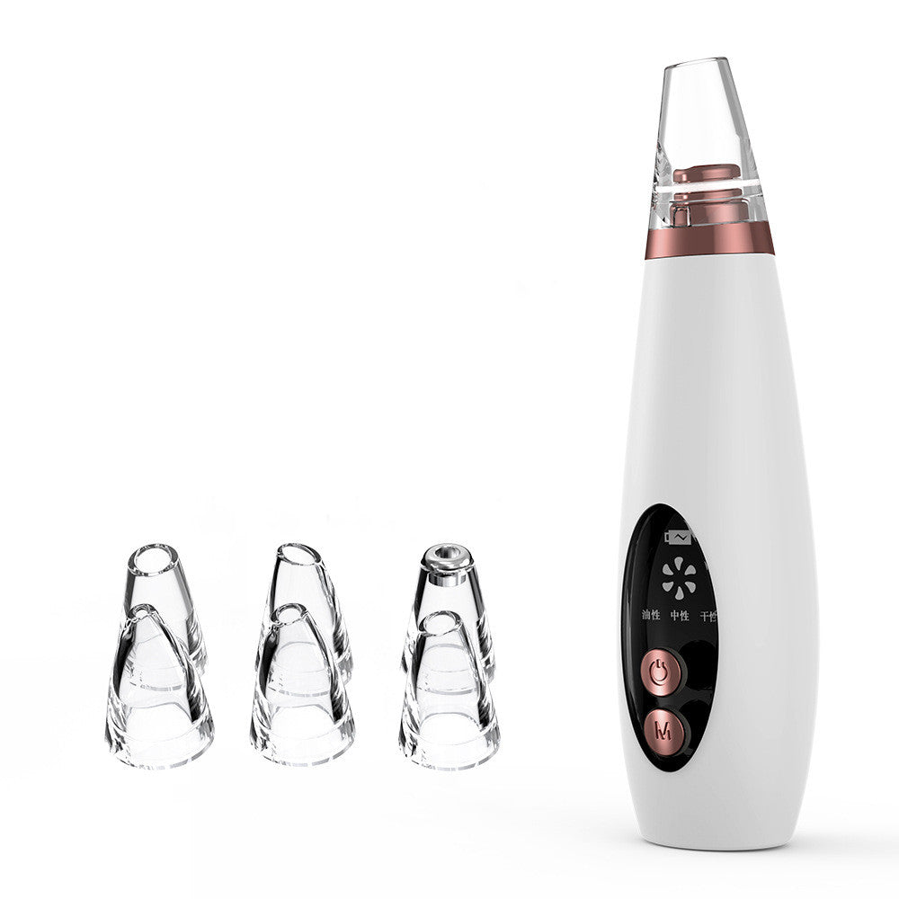White handheld blackhead remover device with three clear attachment tips
