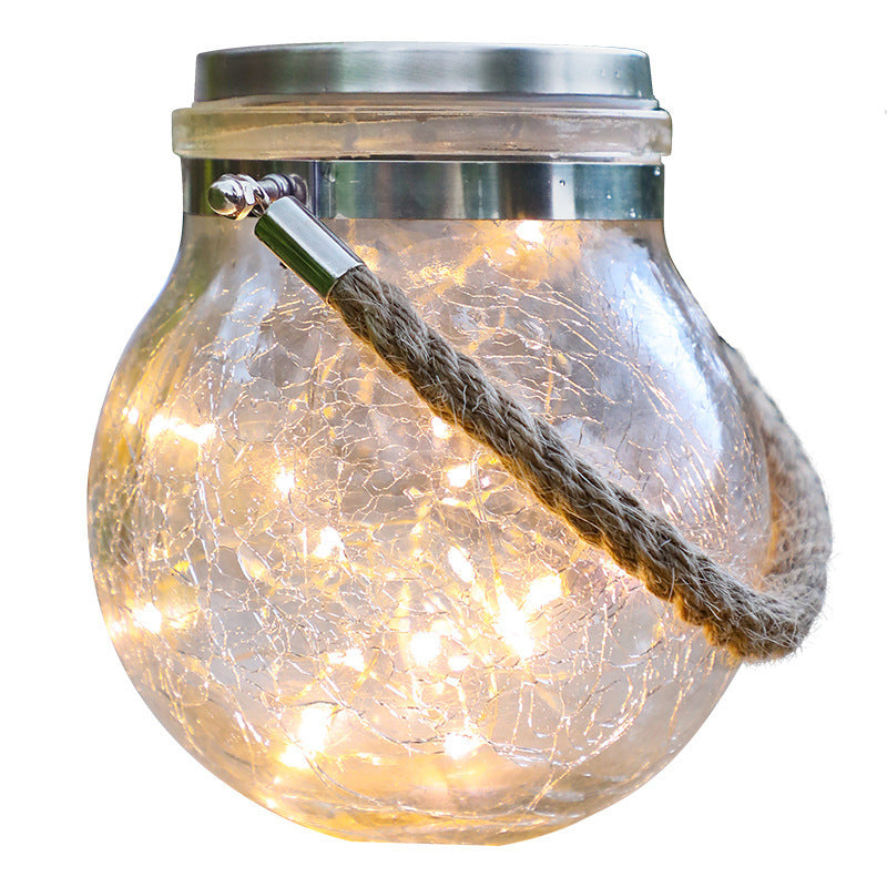 Crackle glass jar light with gold lid, rope strap, warm glow