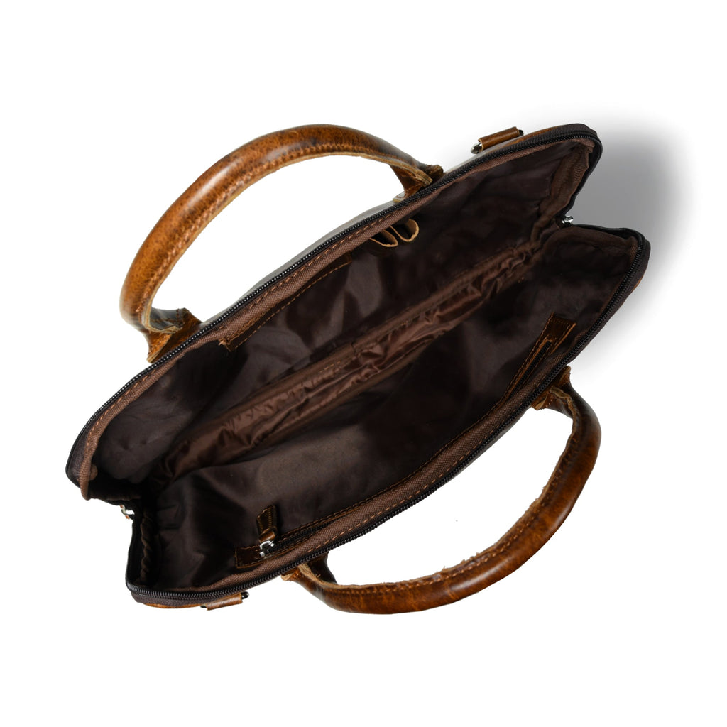 Dark brown leather laptop bag open, showing lined interior and zipper
