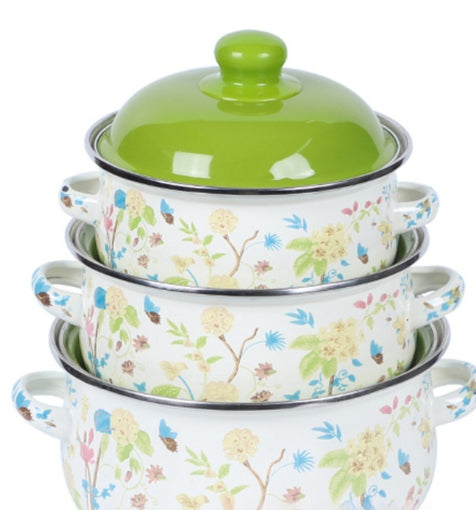 Three-piece enameled noodle bowl set with green lid and spring garden print.