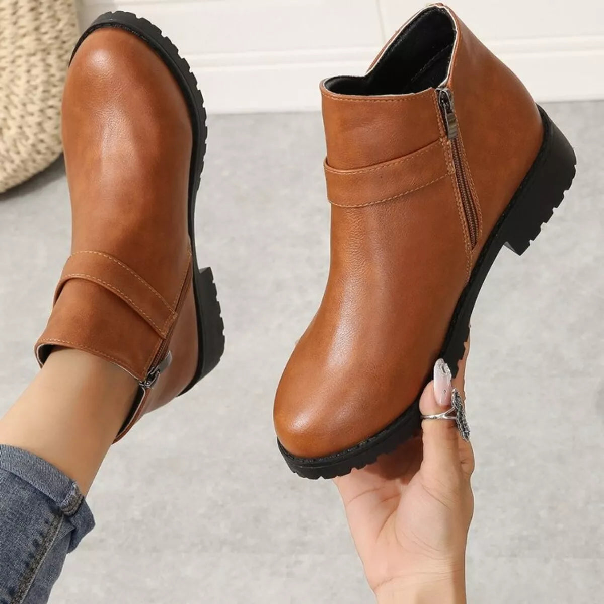 Caramel ankle boot with side zipper and stitched panels, chunky rubber sole