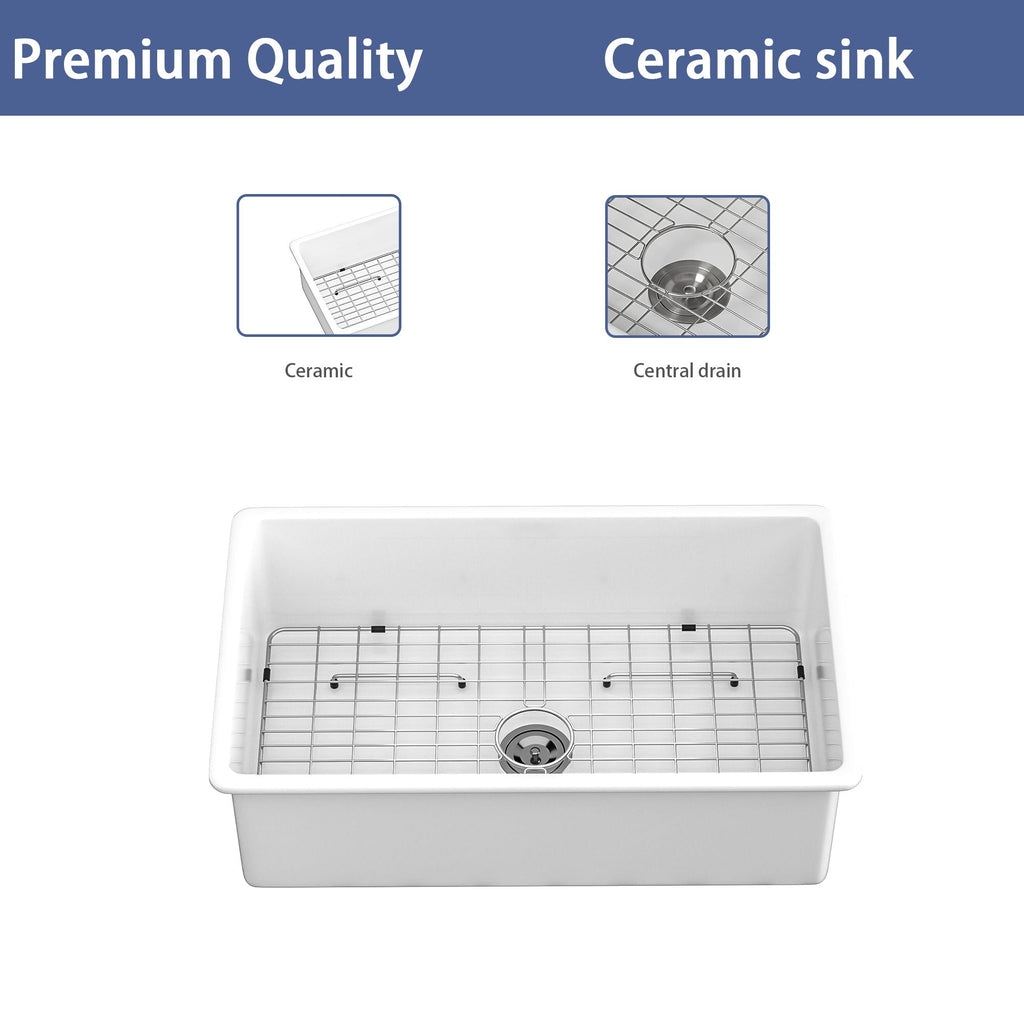 White ceramic single-bowl sink with wire rack grid and centered drain opening