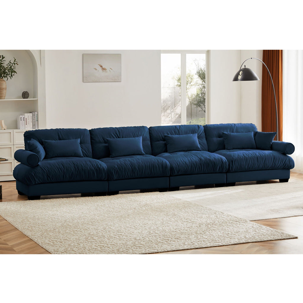 Blue modular L-shaped sectional sofa with deep seats and cushioned back cushions