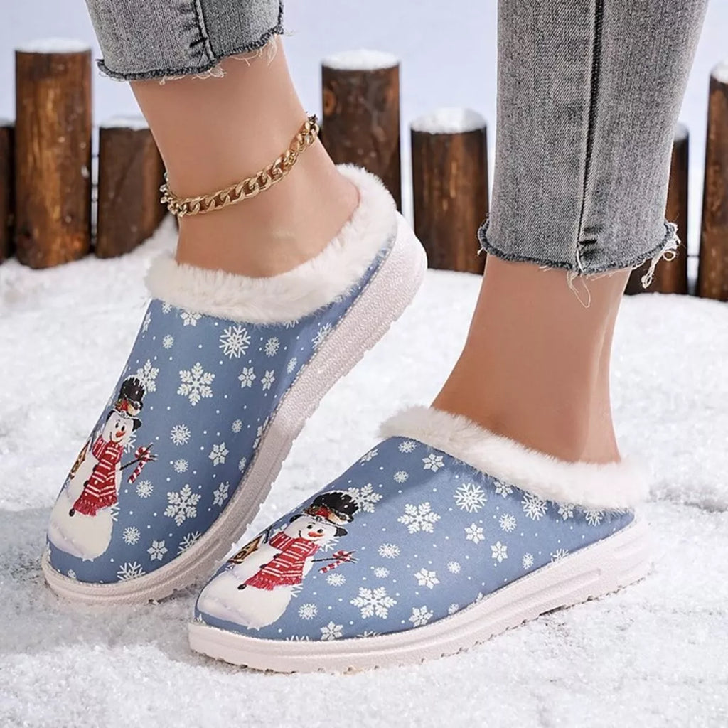 Blue Christmas slippers with plush collar, white sole, and front snowman print