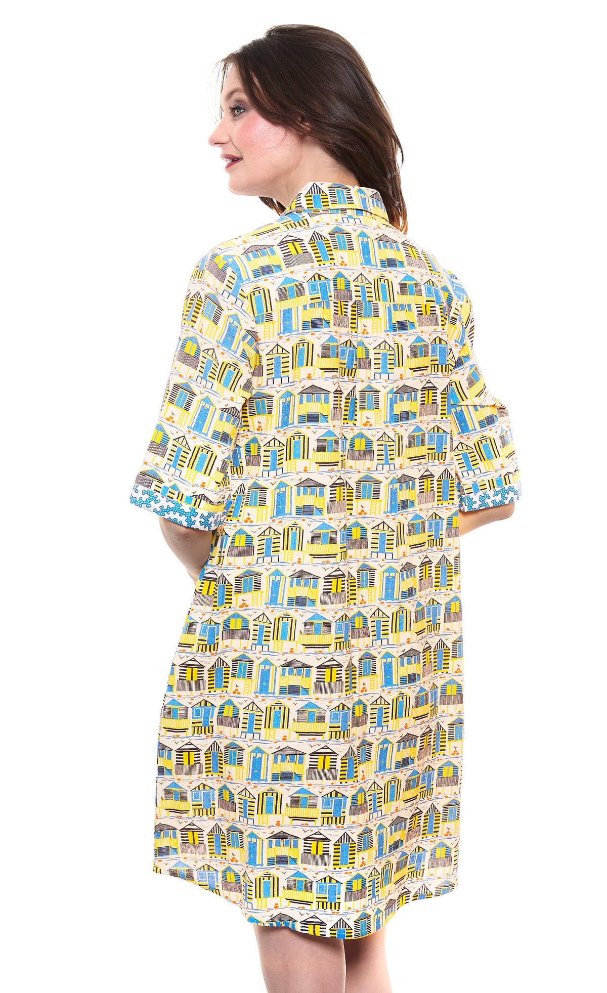 Cabana print cotton-linen shirt dress, short sleeves, side view with curved hem