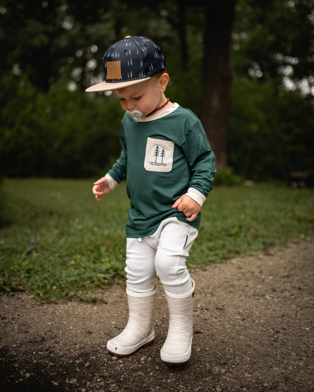Green bamboo long-sleeve shirt with cream collar and chest pocket, tree print