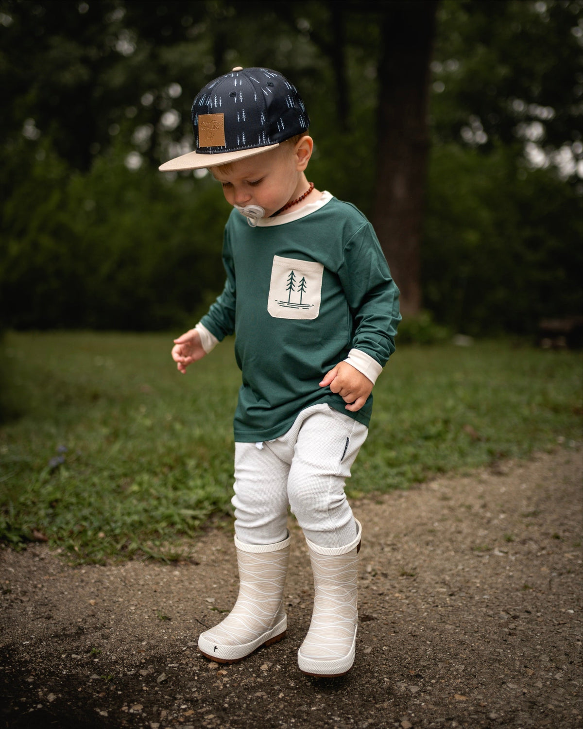 Green bamboo long-sleeve shirt with cream collar and chest pocket, tree print