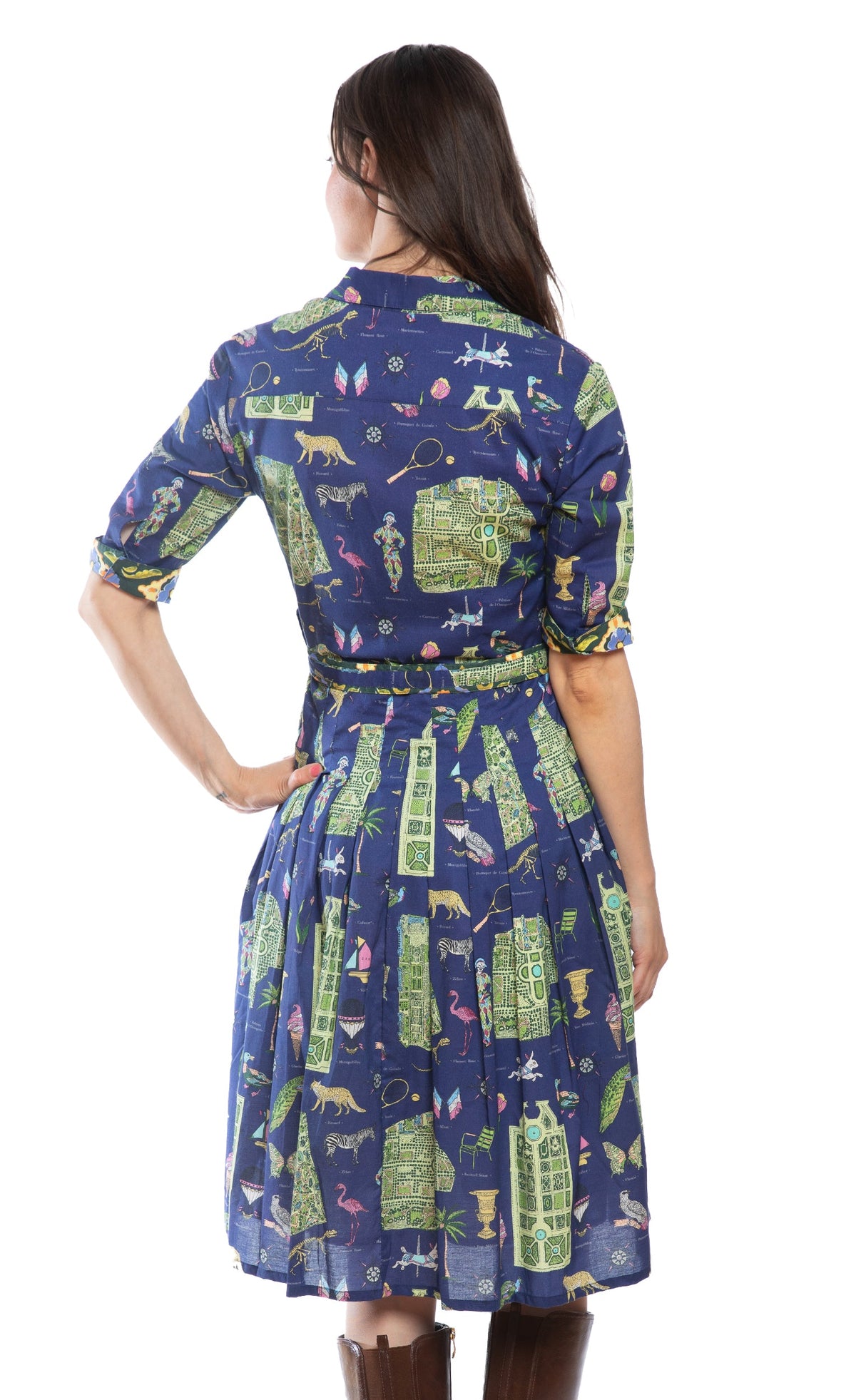 Back view navy dress with Paris map print, gathered waist and pleated skirt