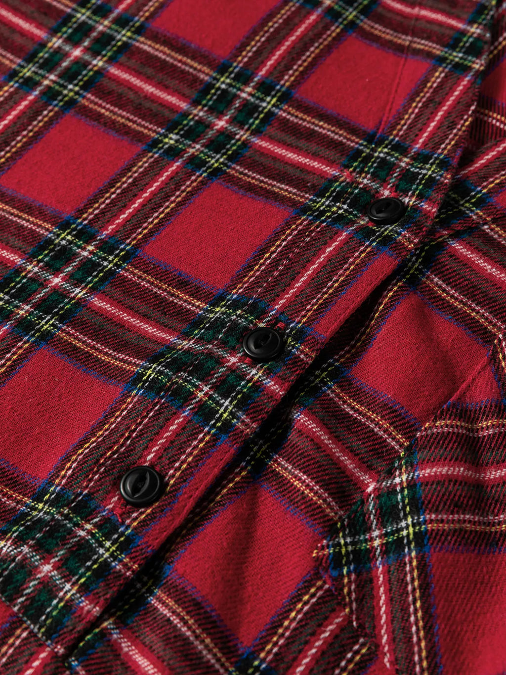 Burgundy plaid dress front with half-button placket and three black buttons