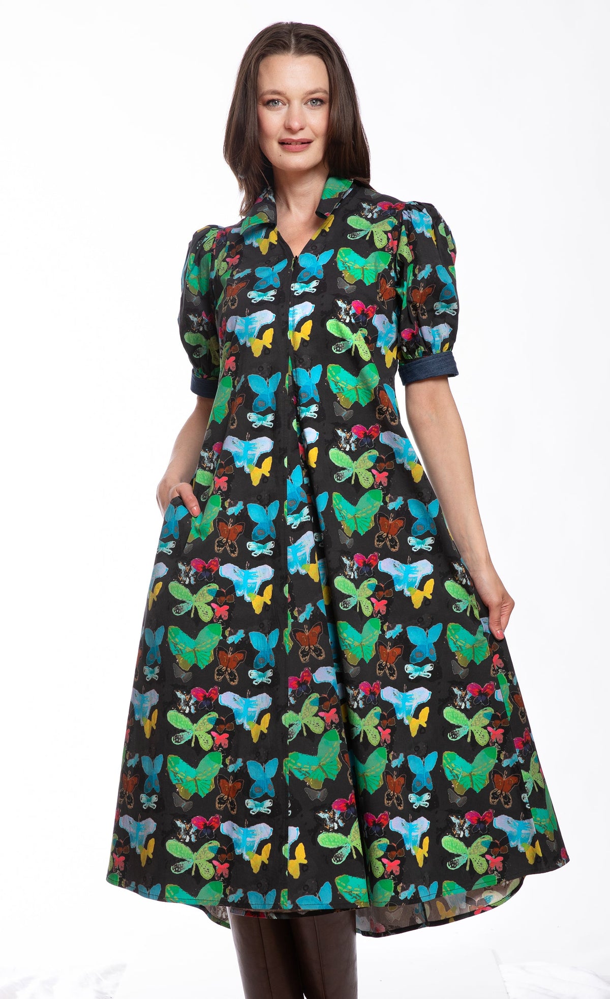 Black collared short-sleeve dress with colorful butterfly print and pleated skirt