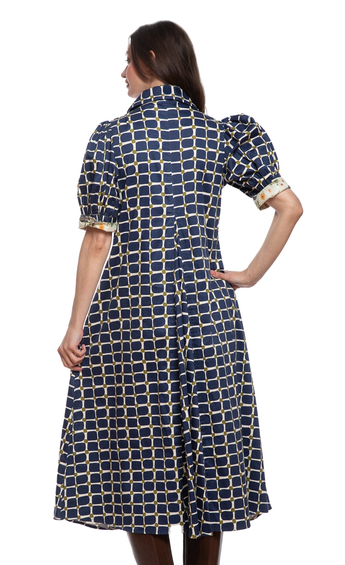 Back view of navy grid print midi dress with short sleeves and V-shaped yoke