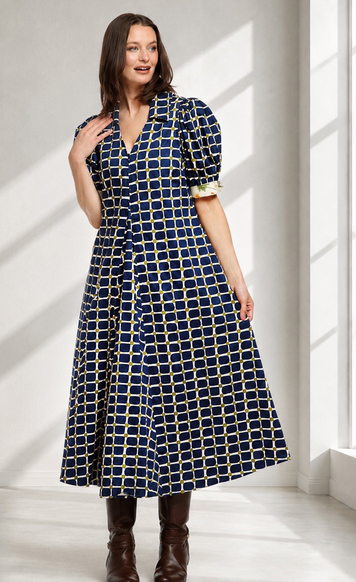 Navy grid print midi dress with V-neck and short puff sleeves
