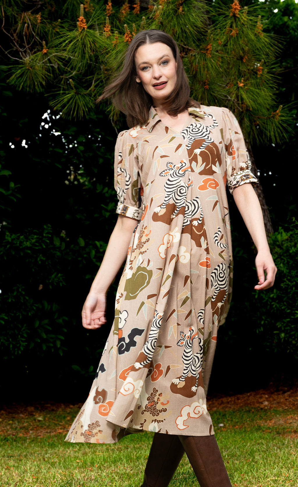 Tan safari-print midi dress with short sleeves and full gathered skirt