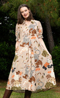 Beige safari-print midi dress with 3/4 sleeves and gathered skirt