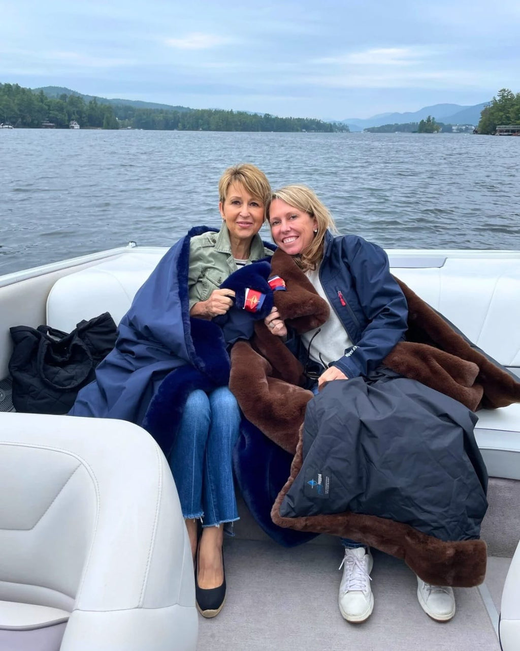 Large outdoor blanket, navy shell with warm brown faux-fur underside