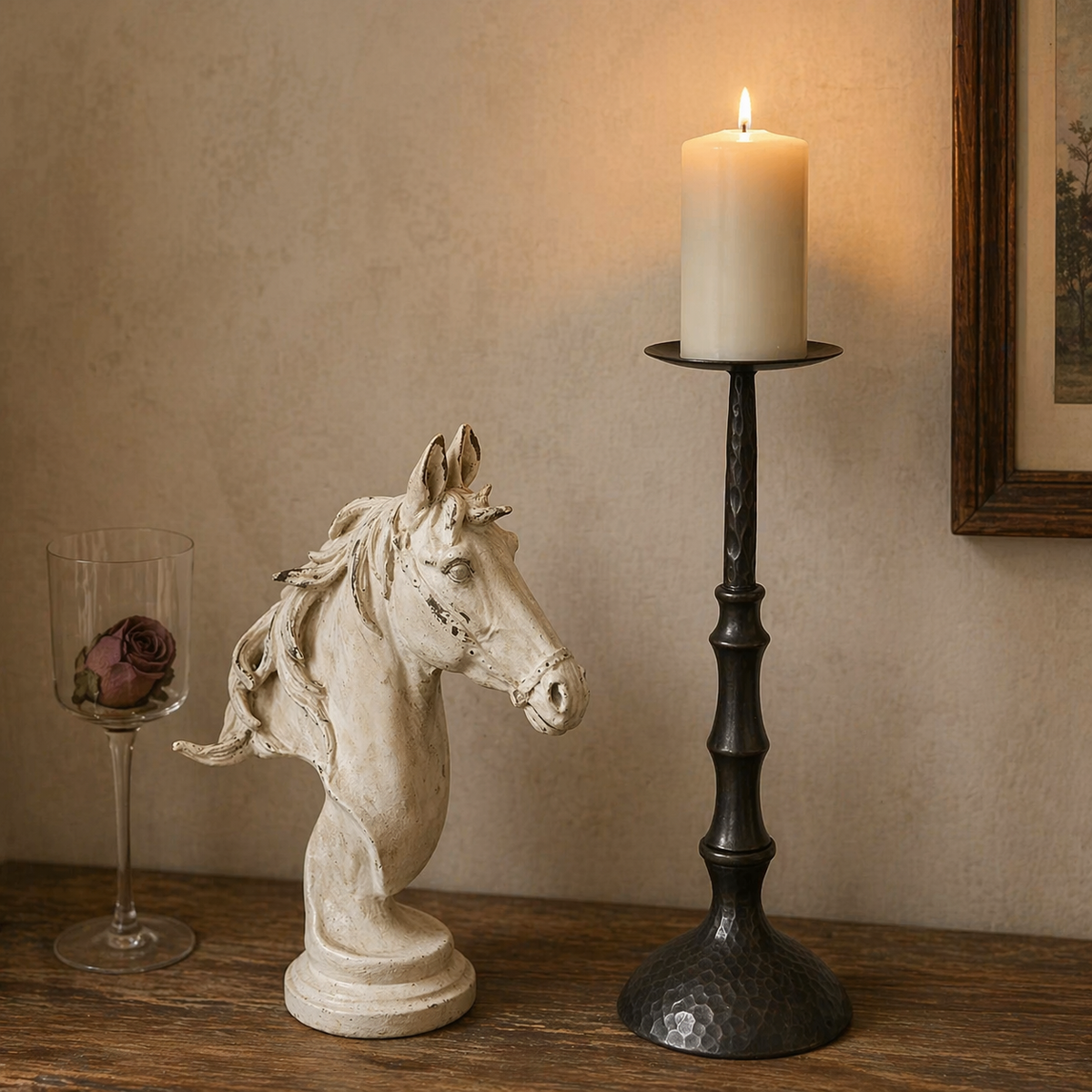 Hammered metal pillar candle holder with round plate top and textured base, white candle