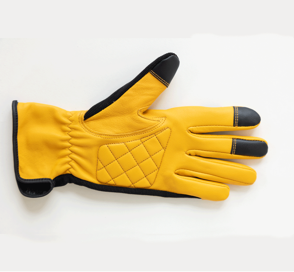 Yellow work gloves with black wrist trim and quilted palm padding